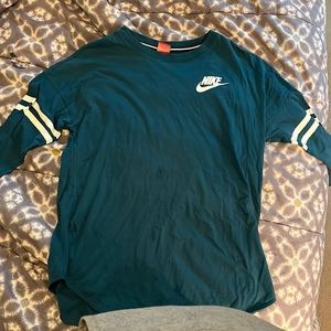 Nike- Just do it long sleeve. Slight stain on stomach not very noticeable.